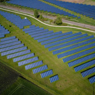 Photo of solar farm by Andreas Gücklhorn on Unsplash